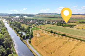 umístění pozemku vzhledem k okolí - Prodej pozemku 699 m², Vraňany 