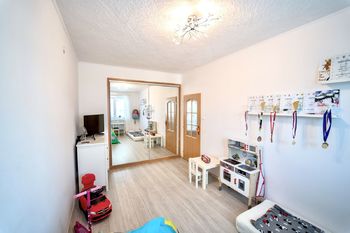 Dětský pokoj - Prodej bytu 3+1 v osobním vlastnictví 72 m², Praha