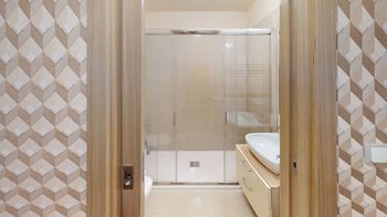 koupelna s WC - Prodej bytu 4+kk v osobním vlastnictví 151 m², Harrachov