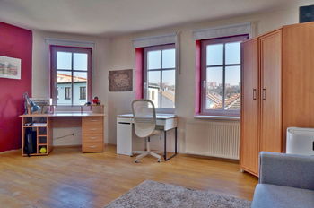 Obývací pokoj - Prodej bytu 1+1 v osobním vlastnictví 52 m², Brno