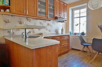 Kuchyně s jídelním koutem - Prodej bytu 1+1 v osobním vlastnictví 52 m², Brno