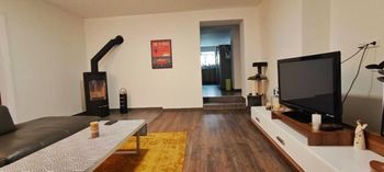 Obývací pokoj - Prodej bytu 2+1 v osobním vlastnictví 80 m², Jeseník