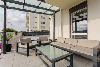 Zastřešená část terasy - Prodej bytu 4+kk v osobním vlastnictví 103 m², Brno
