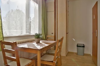 Jídelní kout - Prodej bytu 1+1 v osobním vlastnictví 43 m², Brno