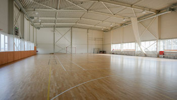 Sportovní hala - Prodej pozemku 848 m², Blučina
