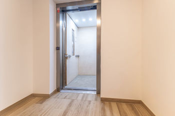 v domě je výtah - Prodej bytu 2+kk v osobním vlastnictví 52 m², Slaný