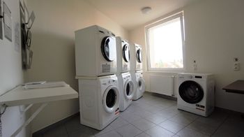 prádelna v domě - Prodej bytu 2+1 v osobním vlastnictví 61 m², Praha 10 - Hostivař