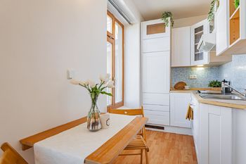 Kuchyňský kout - Prodej bytu 1+kk v osobním vlastnictví 28 m², Praha 10 - Vinohrady
