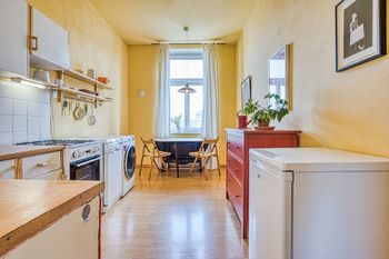 Kuchyně s jídelním koutem - Prodej bytu 1+1 v osobním vlastnictví 38 m², Praha 7 - Holešovice