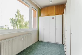 Pokoj (popř. šatna). - Pronájem bytu 4+1 v osobním vlastnictví 82 m², Jindřichův Hradec