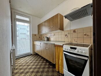 kuchyně s balkonem - Prodej bytu 2+1 v osobním vlastnictví 58 m², Nové Hrady 