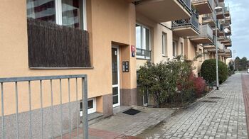 vchod - Prodej bytu 1+kk v osobním vlastnictví 25 m², Praha 9 - Černý Most 