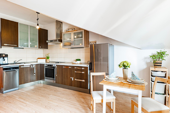 Kuchyně. - Prodej bytu 1+kk v osobním vlastnictví 52 m², Nupaky