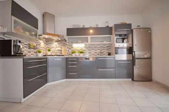 Prodej nájemního domu 200 m², Slaný