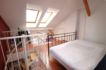 místnost v horním patře - Prodej bytu 3+kk v osobním vlastnictví 114 m², Praha 4 - Nusle