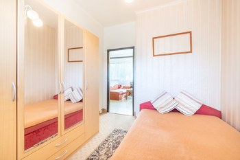 Ložnice s šatní skříní - Prodej bytu 2+kk v osobním vlastnictví 47 m², Praha 4 - Krč