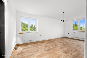 Obývací pokoj - Prodej bytu 2+1 v osobním vlastnictví 52 m², Černá v Pošumaví