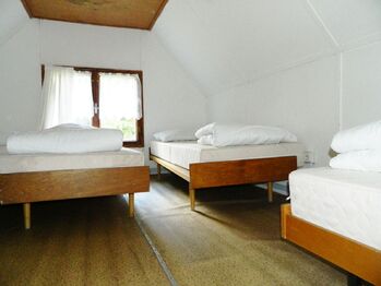 Ložnice ve srubu. - Prodej ubytovacího zařízení 1220 m², Velká Turná