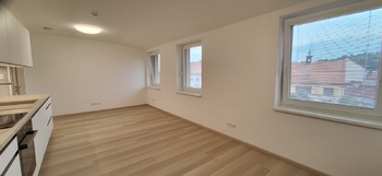 Obývací pokoj s kuchyňskou linkou - Pronájem bytu 2+kk v osobním vlastnictví 52 m², Bučovice
