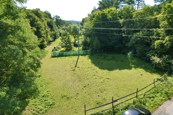 přední část pozemku od komunikace - Prodej pozemku 7909 m², Všestary