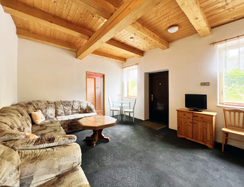Obývací pokoj se vstupem Apartmán 2 - Prodej ubytovacího zařízení 510 m², Jindřichovice