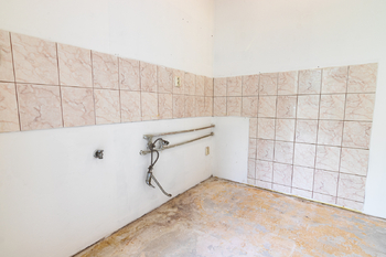 kuchyňský kout - Prodej bytu 1+kk v družstevním vlastnictví 33 m², Kladno