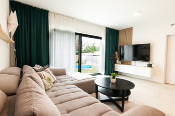 obývací pokoj - Prodej domu 191 m², Praha 8 - Ďáblice