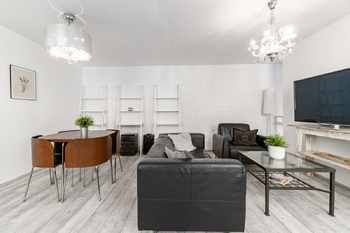 Obývací část - Prodej bytu atypický v osobním vlastnictví 60 m², Praha 8 - Karlín 
