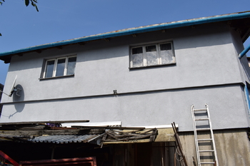 Zadní pohled na zateplenou část domu - Prodej domu 132 m², Jeseník