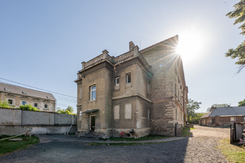 Prodej nájemního domu 1065 m², Postoloprty