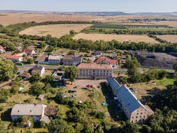 Prodej nájemního domu 1065 m², Postoloprty