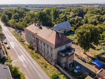 Prodej nájemního domu 1065 m², Postoloprty