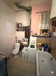 Koupelna bytu v patře - Prodej nájemního domu 1096 m², Ústí nad Labem