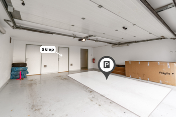 vnitřní sdílené garážové stání a sklep - Prodej bytu 4+kk v osobním vlastnictví 122 m², Dolní Břežany