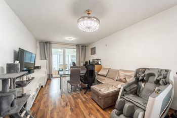 Obývací pokoj - Prodej bytu 3+kk v osobním vlastnictví 92 m², Praha 9 - Újezd nad Lesy