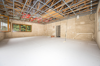 Obývací pokoj, kuchyňský kout - Prodej domu 192 m², Dubí