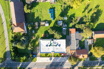 Pohled na dům a okolí - Prodej bytu 3+kk v osobním vlastnictví 81 m², Opočnice