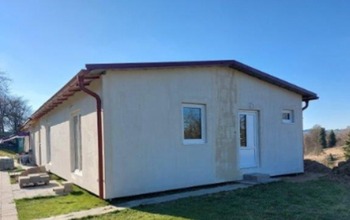 Nový d§m, v němž se byt nachází. - Pronájem bytu 2+kk v osobním vlastnictví 48 m², Dražice