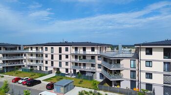Pohled na bytový dům - Prodej bytu 3+kk v osobním vlastnictví 107 m², Brandýs nad Labem-Stará Boleslav 