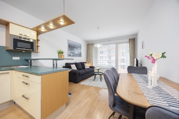 Obývací pokoj s kuchyňským koutem - Prodej bytu 2+kk v osobním vlastnictví 67 m², Praha 5 - Zličín