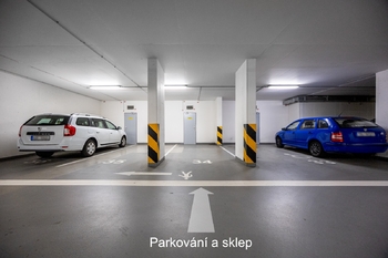 Garážové stání a sklepní kóje - Prodej bytu 2+kk v osobním vlastnictví 67 m², Praha 5 - Zličín