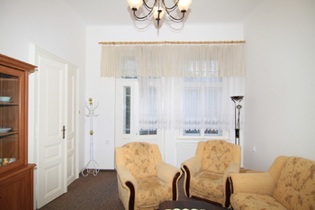 Obývací pokoj - Prodej bytu 2+1 v osobním vlastnictví 82 m², Mariánské Lázně