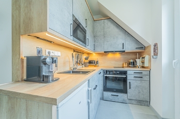 Kuchyňský kout - Prodej bytu 2+kk v osobním vlastnictví 67 m², Pernink