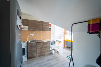 Kuchyň bytu č. 2 - Prodej domu 197 m², Praha 8 - Ďáblice