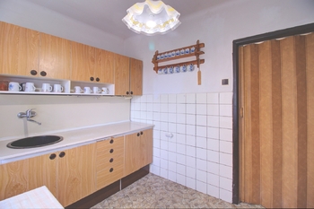 kuchyně - Prodej bytu 1+1 v osobním vlastnictví 32 m², Kladno