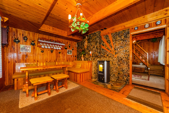4. Obývací pokoj v přízemí - Prodej chaty / chalupy 85 m², Zbiroh