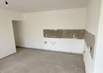 Pohled na místo pro kuchyň a spíž - Prodej domu 235 m², Hořín