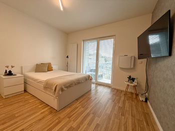 Obývací pokoj  - Prodej bytu 1+kk v osobním vlastnictví 34 m², Praha 9 - Libeň