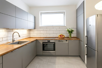 Kuchyň - vizualizace budoucího stavu - Prodej bytu 3+1 v osobním vlastnictví 100 m², Praha 6 - Břevnov