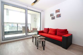 Obývací pokoj - Prodej bytu 1+kk v osobním vlastnictví 36 m², Praha 9 - Libeň